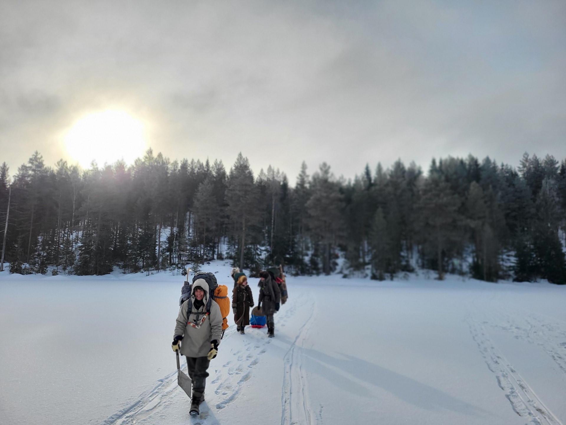 A person walking through a snowy landscape